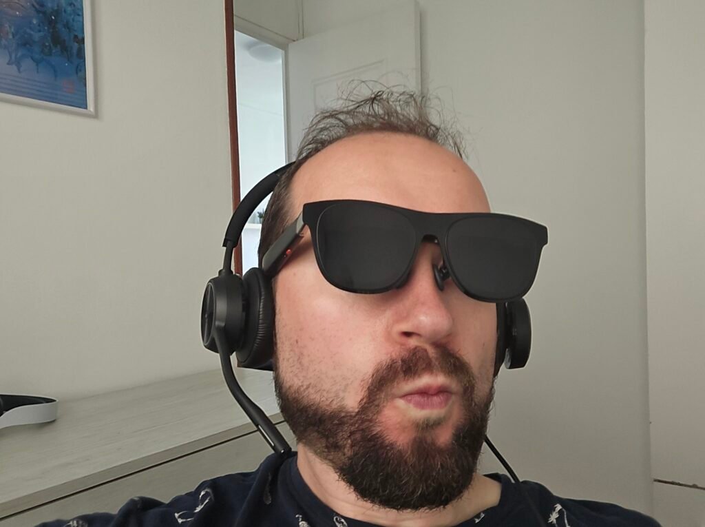 Me wearing XReal One Pro glasses